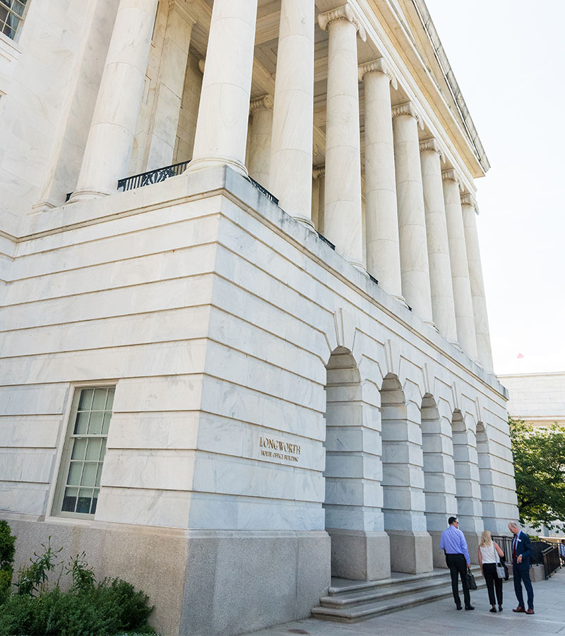 on the steps of a federal building