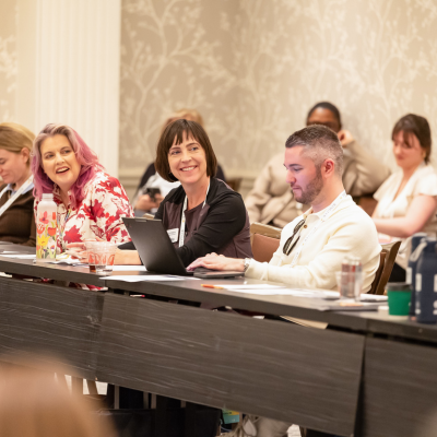 Group-Laughing-in-Meeting